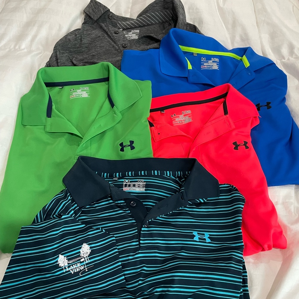 5 UA polo shirts.